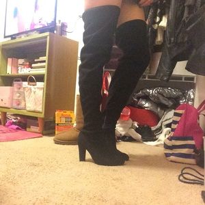 Black thigh high boots
